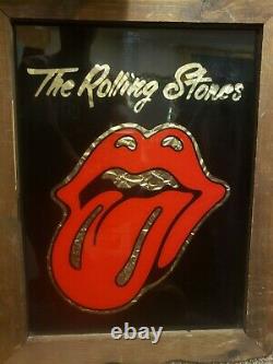 The Rolling Stones felt glass with gold leaf behind it, vintage original